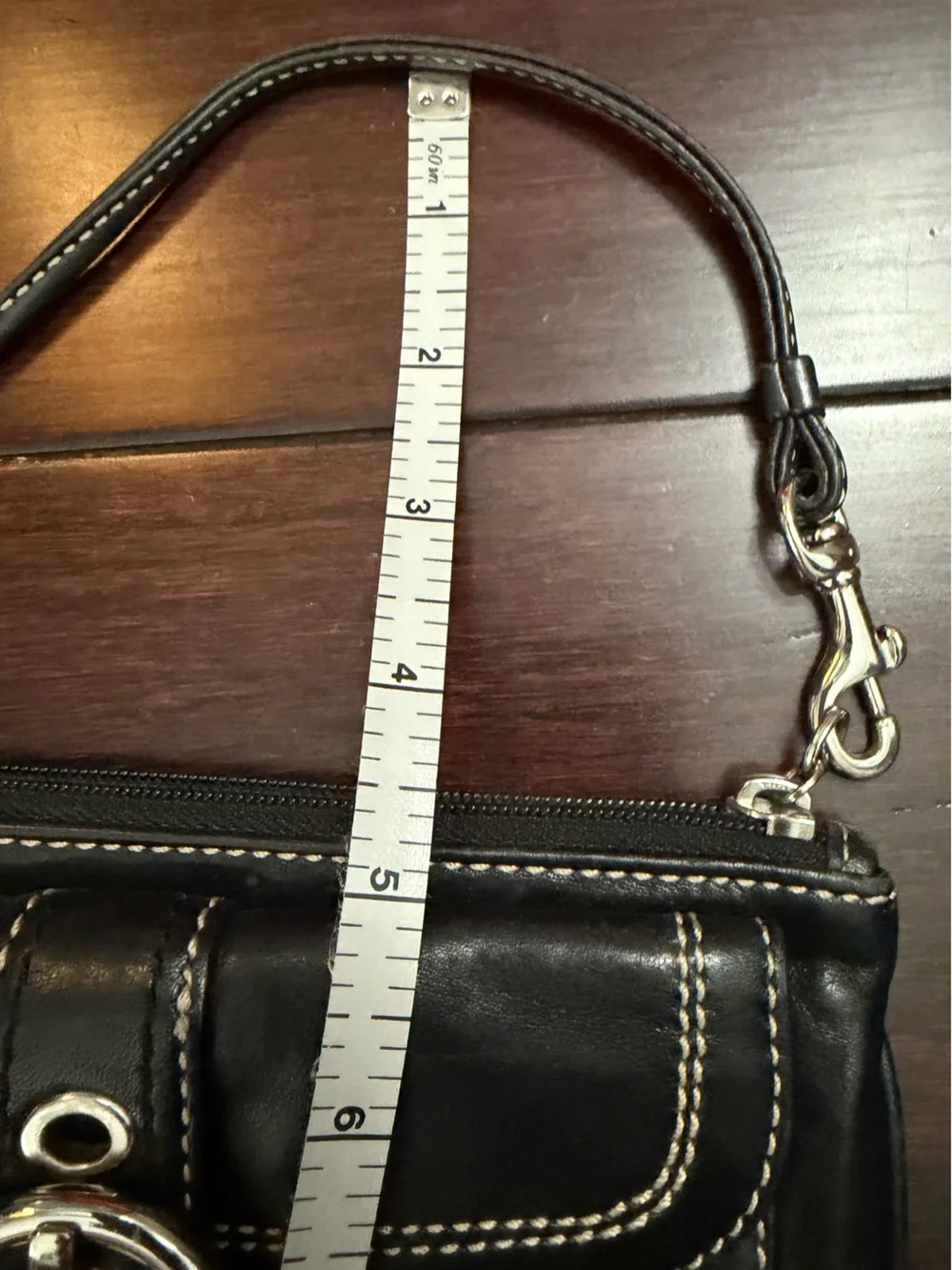 Coach Black Leather Wristlet with Silver Buckle Accent